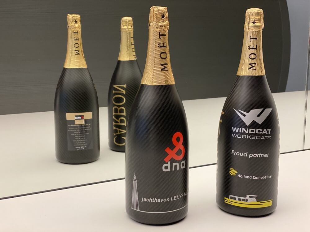 Champagnefles-champagne-bottle-carbon-Holland-Composites-DNA-Performance-Sailing-end-of-year-greetings